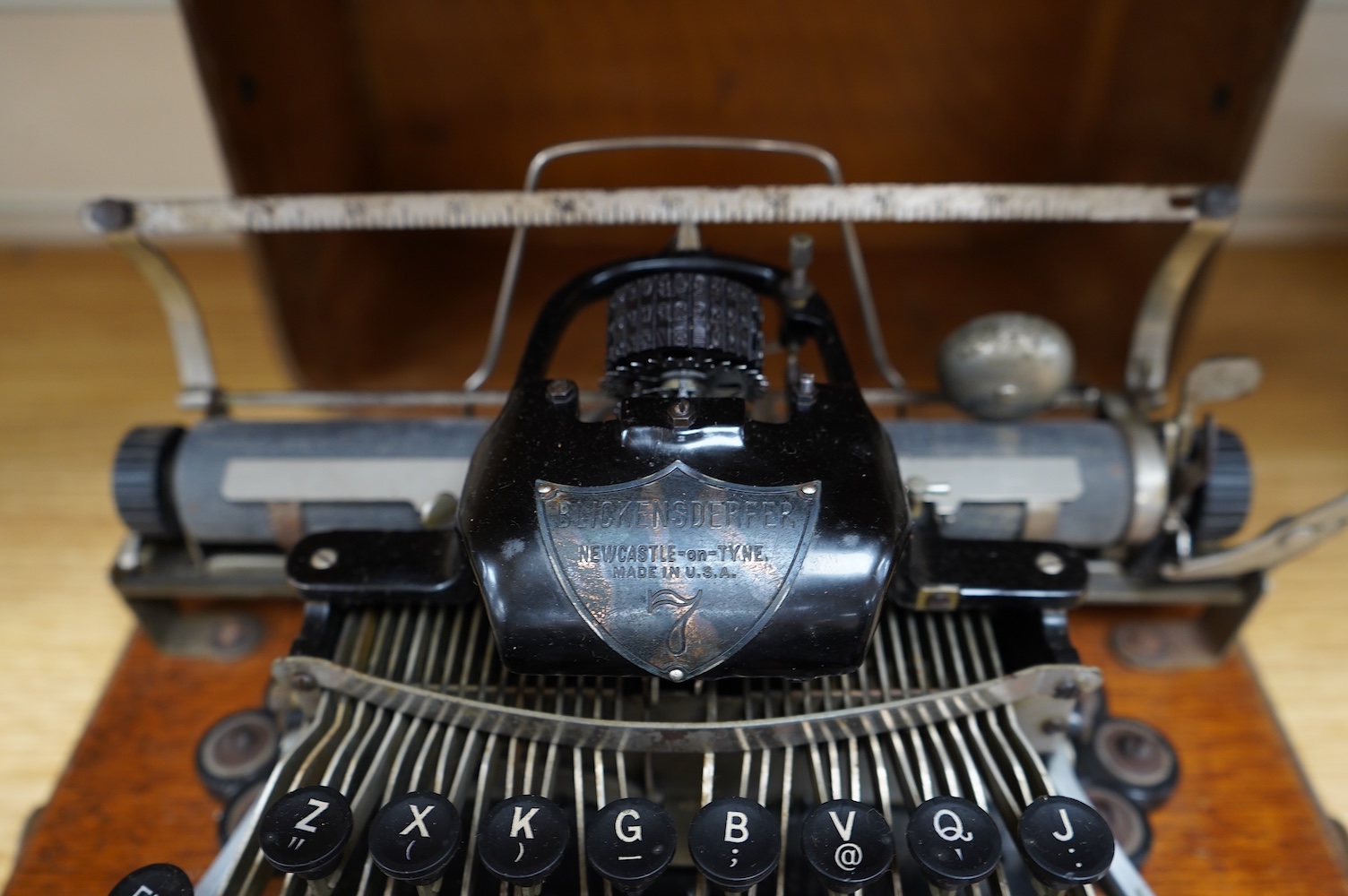 A late 19th century Blickensderfer Newcastle-on-Tyne, manual typewriter, model No.7, in an oak case with oak plywood cover, Made in the USA. Condition - fair to good, the action appears to move smoothly. There are some r